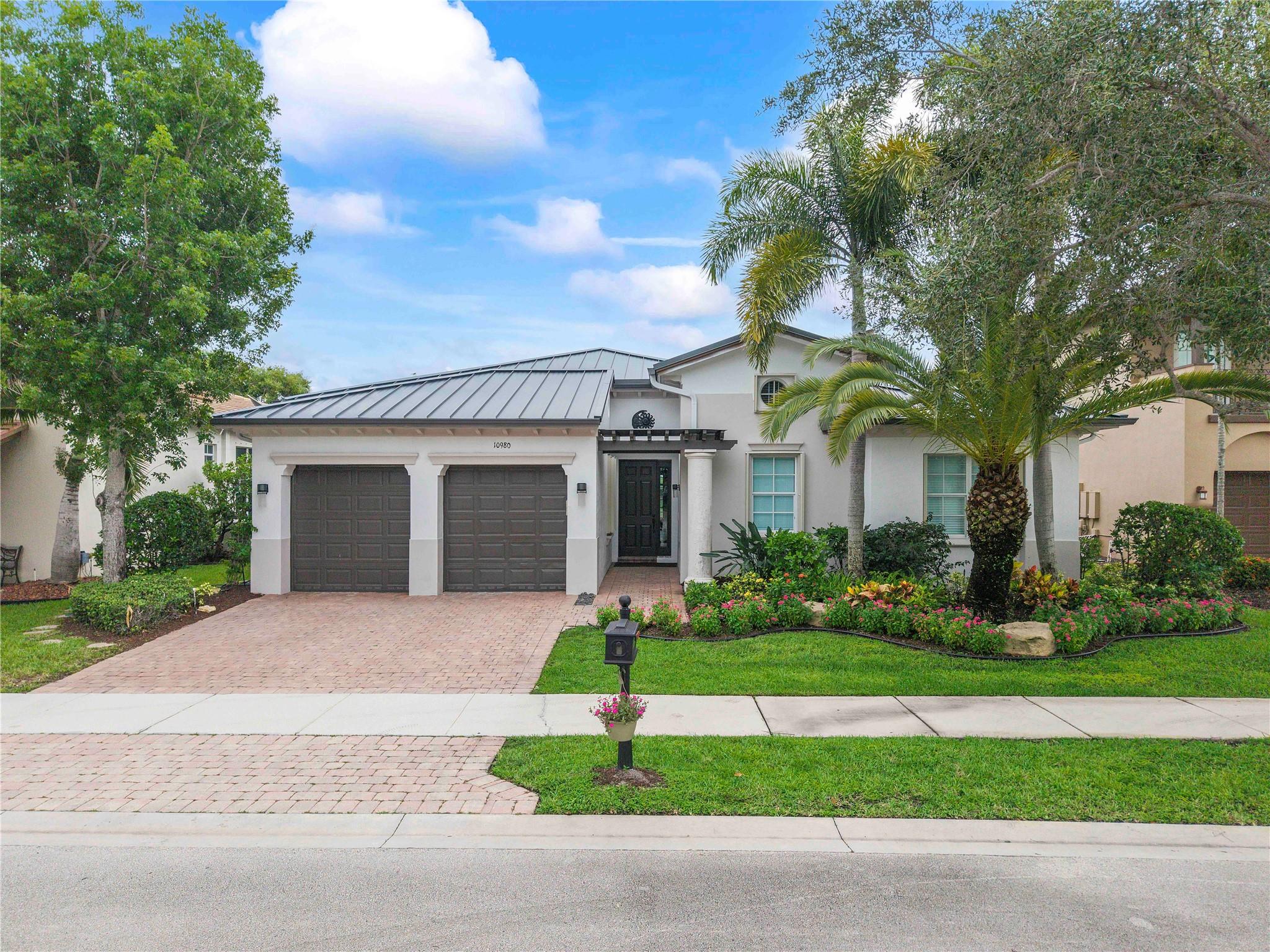 HUGE PRICE REDUCTION, The Glen-Heron Bay,No HOA approval, Updated 5 bedrooms+sitting room/office/nursery on master bedroom extension by orig builder, 3 full bathrooms, extended Cardina model,guard-gated 24/7 security. New $93K metal roof & full new metal gutters & drainpipes, marble & Porcelain flooring. Bright white chef’s kitchen w/white quartz counters & waterfall drops, stainless appliances, newer oven, microwave & dishwasher,updated bright white bathrooms w/quartz countertops,"closets by design" LED lighting, newer white blinds. Mother-in-law or teen suite. Screened back & side patios. fully fenced back garden-PUPPY PICKETS room 4 pool, A+ schools, School bus stop-end of street. 2 resort-style clubhouses & pools, 2 gyms, waterpark, 13 tennis & 6 pickleball cts, basketball,walking trls