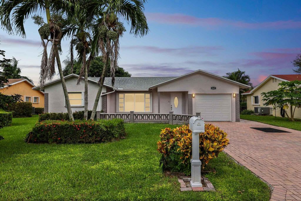 Photo of 9407 NW 70th Pl, Tamarac, FL 33321 (MLS # F10531751)
