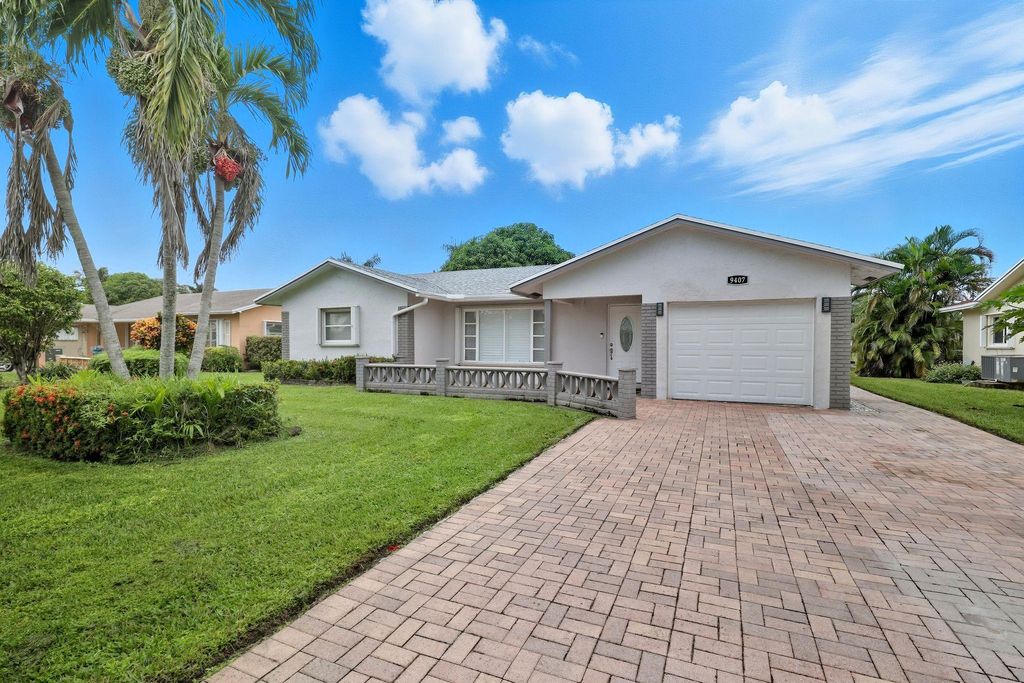 Photo of 9407 NW 70th Pl, Tamarac, FL 33321 (MLS # F10531751)