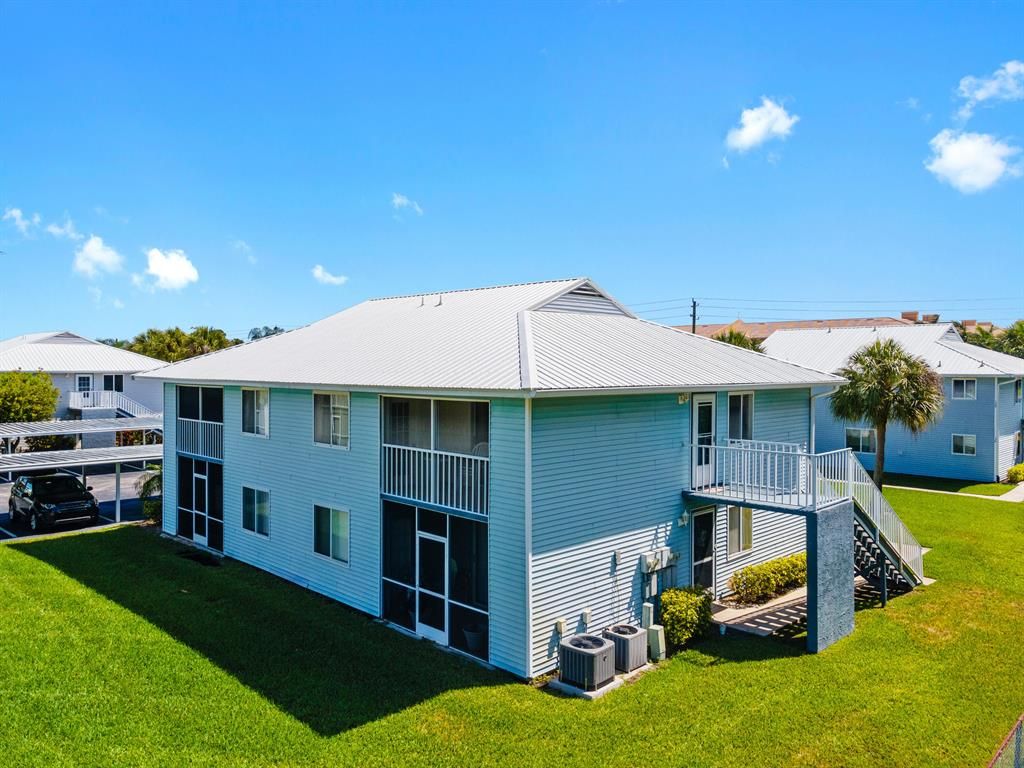 Photo of 133 SE Village Drive #133, Port Saint Lucie, FL 34952 (MLS # R10708617)
