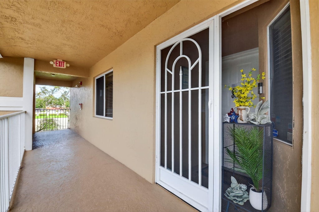 Photo of 5951 Regal Glen Drive #201, Boynton Beach, FL 33437 (MLS # R11111132)