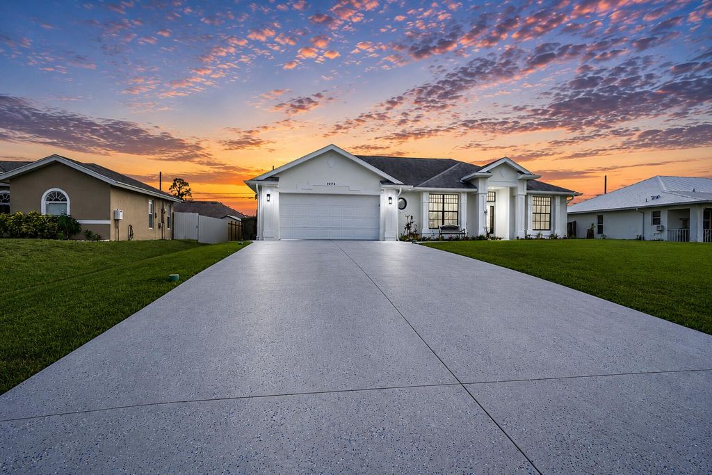 Photo of 1074 SW Liberty Avenue, Port Saint Lucie, FL 34953 (MLS # B26027167)