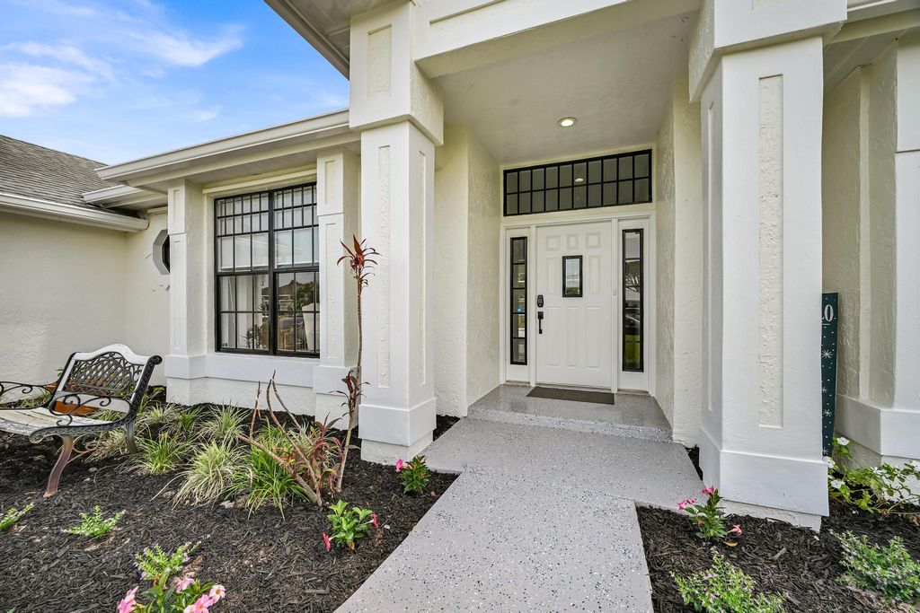 Photo of 1074 SW Liberty Avenue, Port Saint Lucie, FL 34953 (MLS # B26027167)