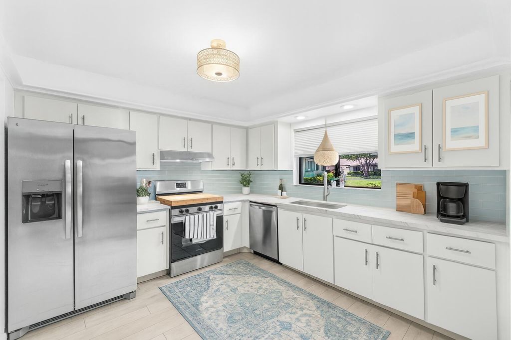 Photo of 4882 Equestrian Circle #B, Boynton Beach, FL 33436 (MLS # R11106687)