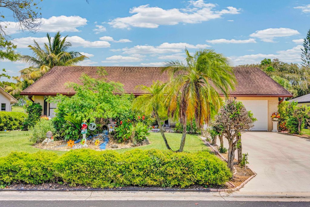 Photo of 164 Meadowlark Drive, Royal Palm Beach, FL 33411 (MLS # B26021568)