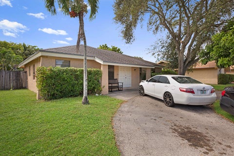 Photo of 1204 SW 74th Avenue, North Lauderdale, FL 33068 (MLS # B26074953)