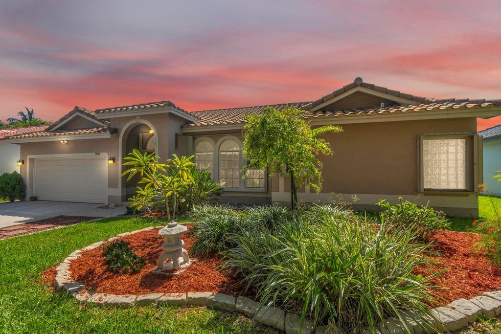 Photo of 5910 NW 40th Lane, Coconut Creek, FL 33073 (MLS # F10502955)
