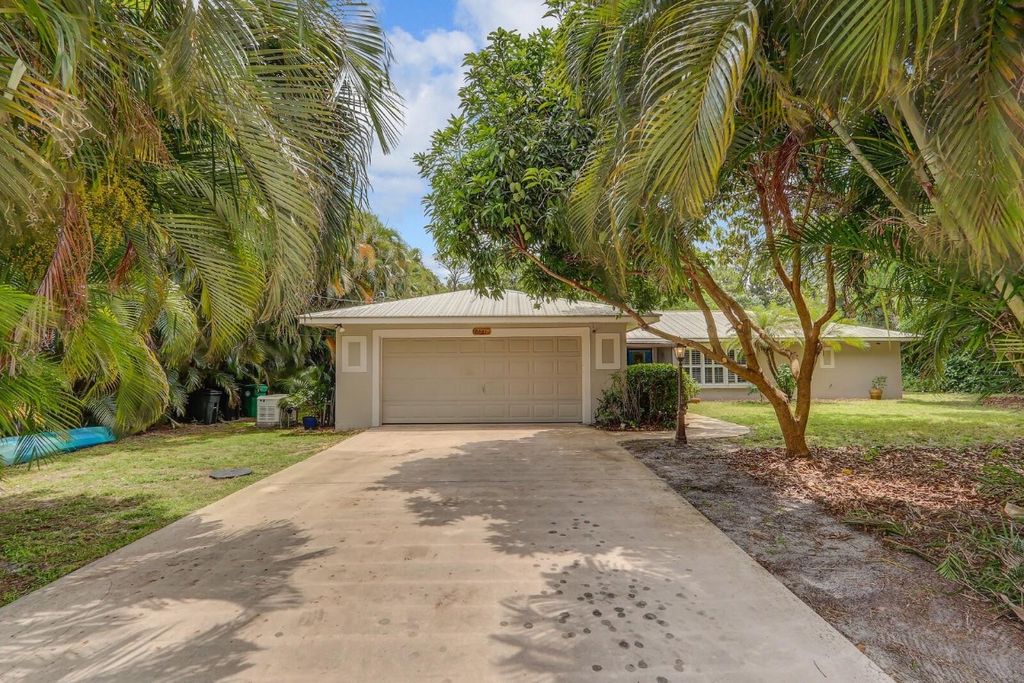 Photo of 2441 SE Delano Road, Port Saint Lucie, FL 34952 (MLS # F10511401)