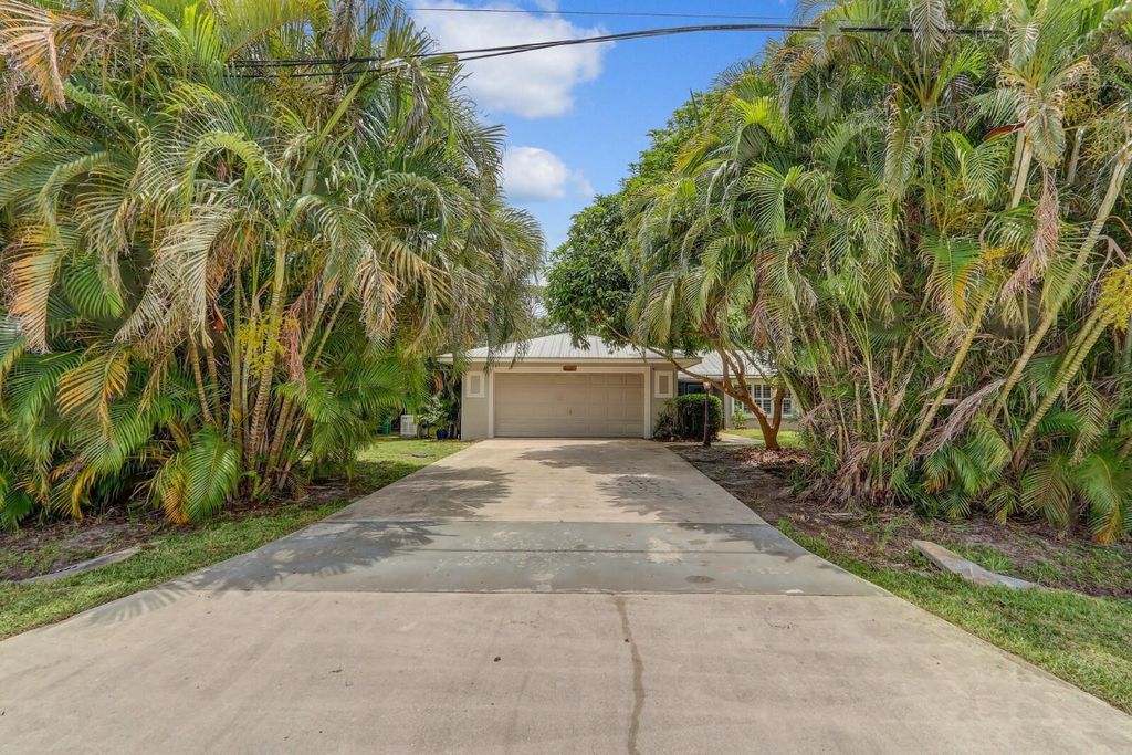 Photo of 2441 SE Delano Road, Port Saint Lucie, FL 34952 (MLS # F10511401)