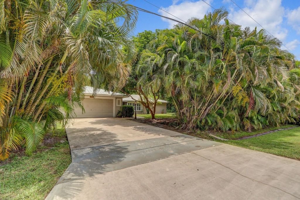 Photo of 2441 SE Delano Road, Port Saint Lucie, FL 34952 (MLS # F10511401)