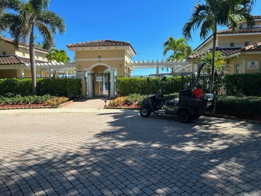 Photo of 1110 Lake Shore Drive #103, Lake Park, FL 33403 (MLS # R11132116)