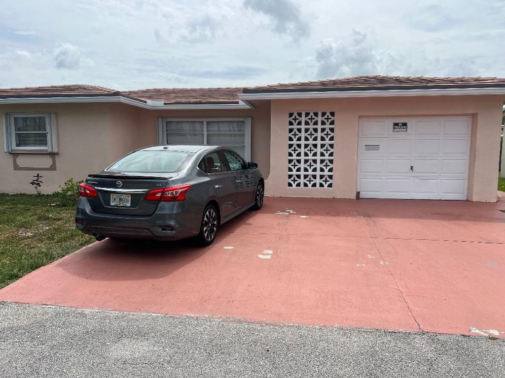 Photo of 5803 NW 86th Avenue, Tamarac, FL 33321 (MLS # B26045923)