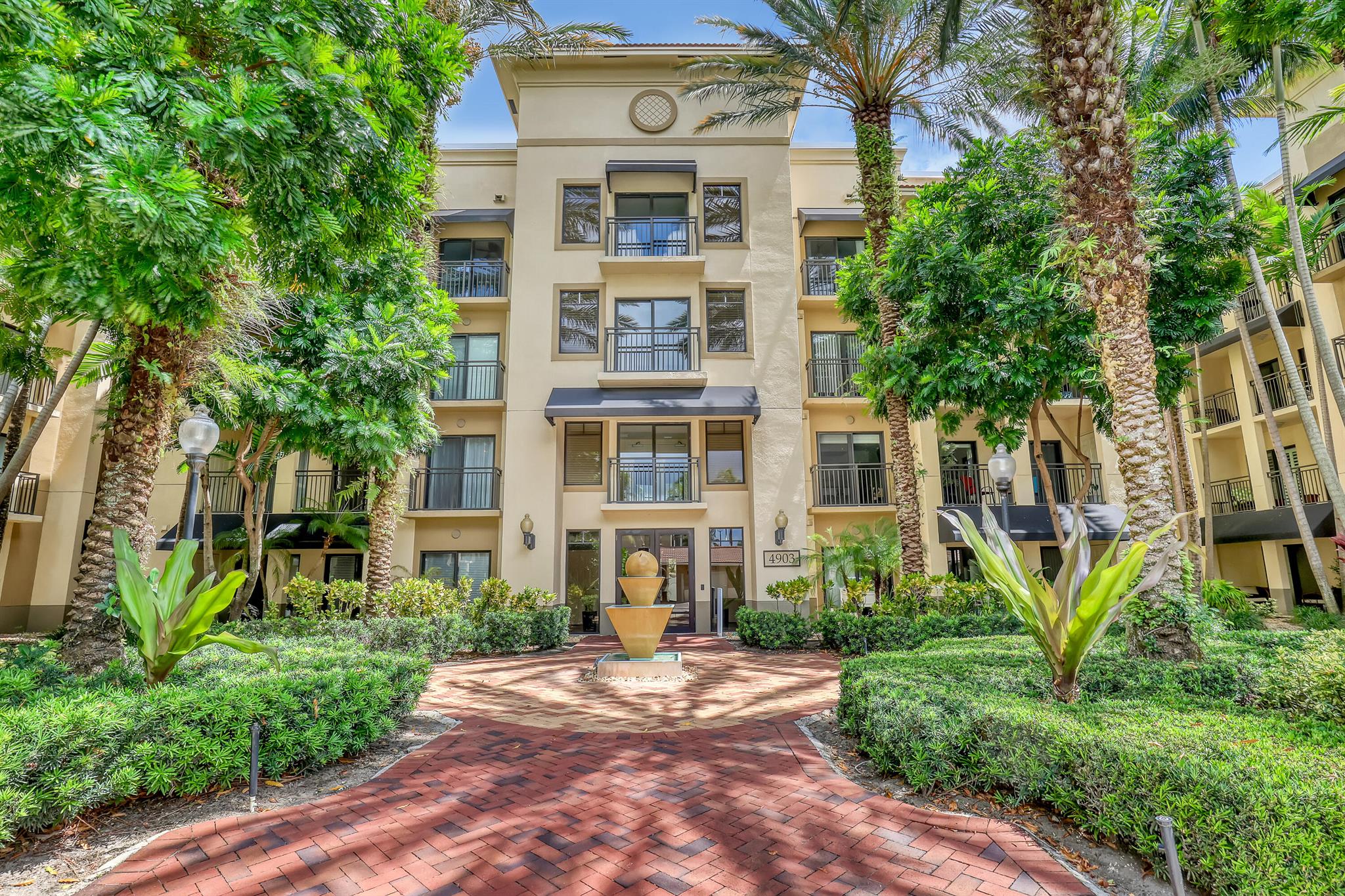 Welcome to Midtown, the ultimate resort-style living! This beautifully updated first-floor 2-bed, 2-bath condo offers comfort, style, and convenience. Perfect for dog lovers and those with an active lifestyle, this pet-friendly home features a modern kitchen, split floor plan for added privacy, and spacious interior ideal for both full-time residence or seasonal getaways. NEW HVAC 2025. Step right outside your unit and enjoy walks along the scenic lake trail or explore the vibrant Midtown area with its array of fabulous restaurants, boutique shops, and entertainment. Residents enjoy access to a stunning clubhouse, state-of-the-art fitness center, business center, and a resort-style heated pool and spa all maintained with fully funded reserves for peace of mind. Don't miss this opportunity