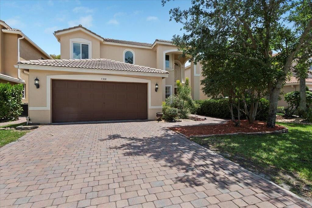 Photo of 7308 Viale Sonata, Lake Worth Beach, FL 33467 (MLS # R10883899)