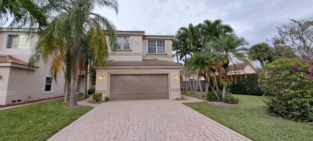 Photo of 3817 NW 62nd Street, Coconut Creek, FL 33073 (MLS # R10943174)