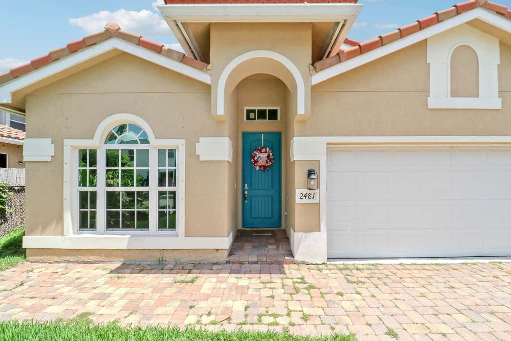 Photo of 2481 SW SILVERADO Street, Palm City, FL 34990 (MLS # B26059755)
