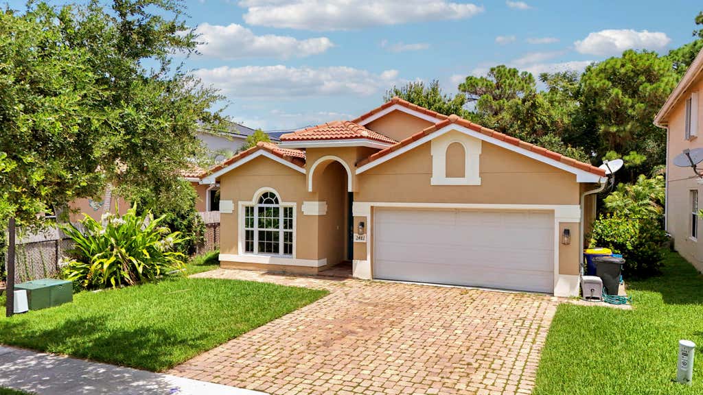 Photo of 2481 SW SILVERADO Street, Palm City, FL 34990 (MLS # B26059755)