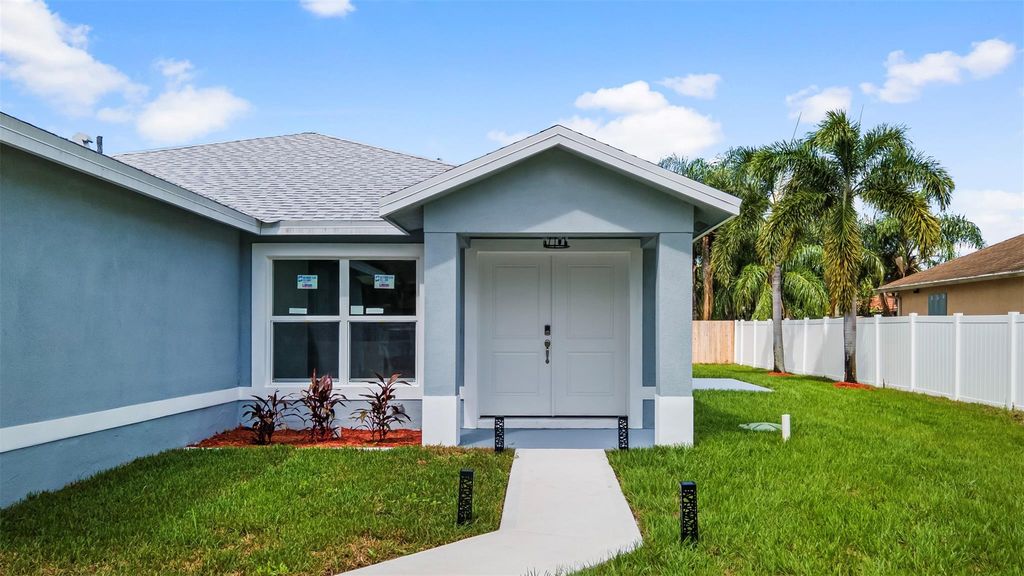 Photo of 543 SW Mccomb Avenue, Port Saint Lucie, FL 34953 (MLS # F10517151)
