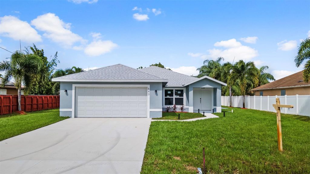 Photo of 543 SW Mccomb Avenue, Port Saint Lucie, FL 34953 (MLS # F10517151)