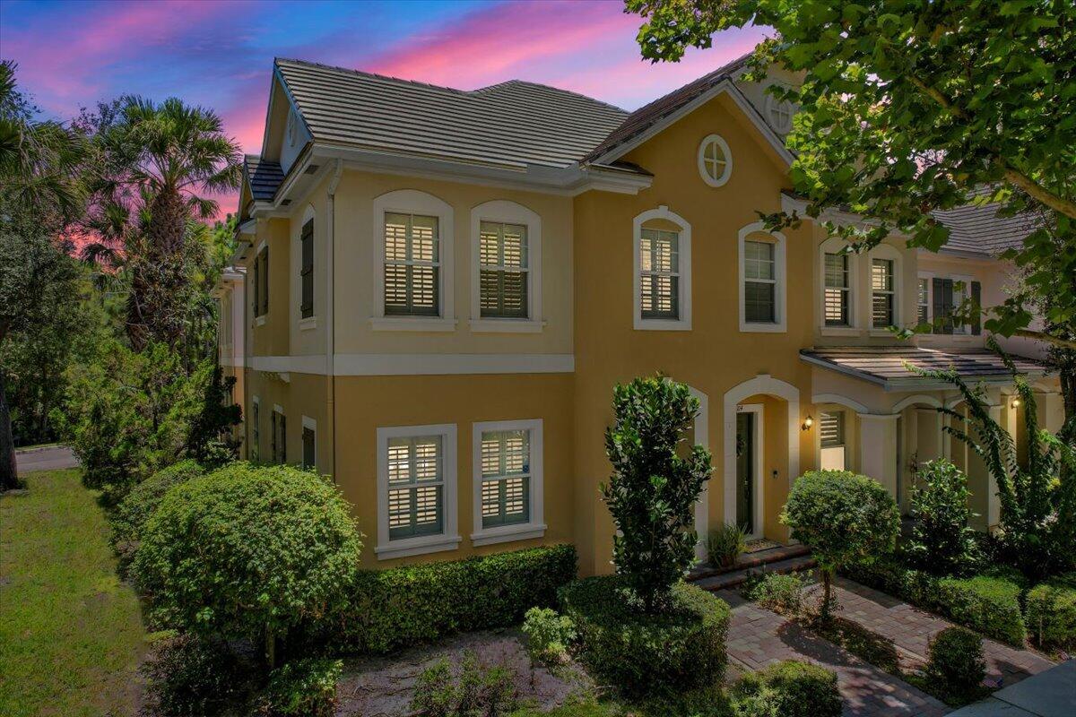 Highly sought-after 4-bedroom Foxford model END-UNIT townhome featuring a spacious STUDIO APARTMENT above the 2-car garage and IMPACT WINDOWS & DOORS. Perfectly positioned on a PREMIUM cul-de-sac lot with its own park and preserve, this home offers both charm and functionality. A private courtyard serves as the heart of the property, connecting the main residence to the detached garage and studio, complete with kitchenette and private bath... ideal for guests, rental income, or a home office. Inside, the open layout maximizes natural light, while outside you'll enjoy AMPLE GUEST PARKING, a picturesque setting and a prime Jupiter location just minutes from dining, shopping, beaches, and walking distance to TOP SCHOOLS. A rare find combining flexibility, comfort and convenience.