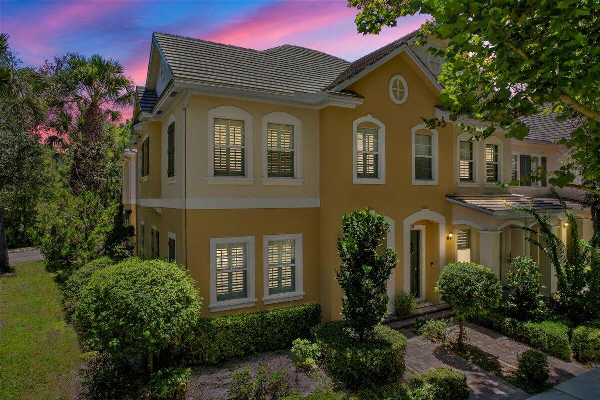 Highly sought-after 4-bedroom Foxford model END-UNIT townhome featuring a spacious STUDIO APARTMENT above the 2-car garage and IMPACT WINDOWS & DOORS. Perfectly positioned on a PREMIUM cul-de-sac lot with its own park and preserve, this home offers both charm and functionality. A private courtyard serves as the heart of the property, connecting the main residence to the detached garage and studio, complete with kitchenette and private bath... ideal for guests, rental income, or a home office. Inside, the open layout maximizes natural light, while outside you'll enjoy AMPLE GUEST PARKING, a picturesque setting and a prime Jupiter location just minutes from dining, shopping, beaches, and walking distance to TOP SCHOOLS. A rare find combining flexibility, comfort and convenience.