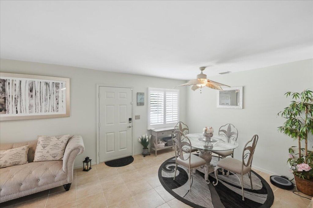 Photo of 103 SE Village Drive, Port Saint Lucie, FL 34952 (MLS # B26019692)