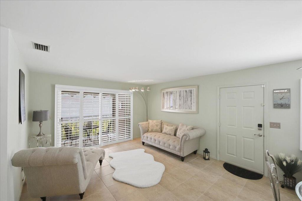 Photo of 103 SE Village Drive, Port Saint Lucie, FL 34952 (MLS # B26019692)