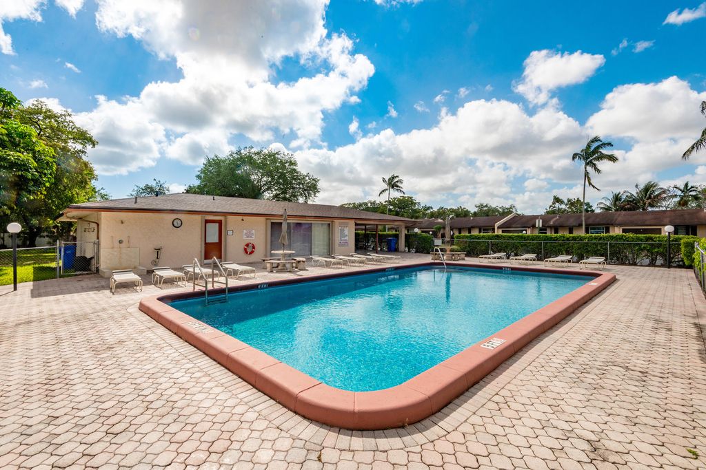 Photo of 7708 Margate Boulevard #C2-1, Margate, FL 33063 (MLS # B26013718)