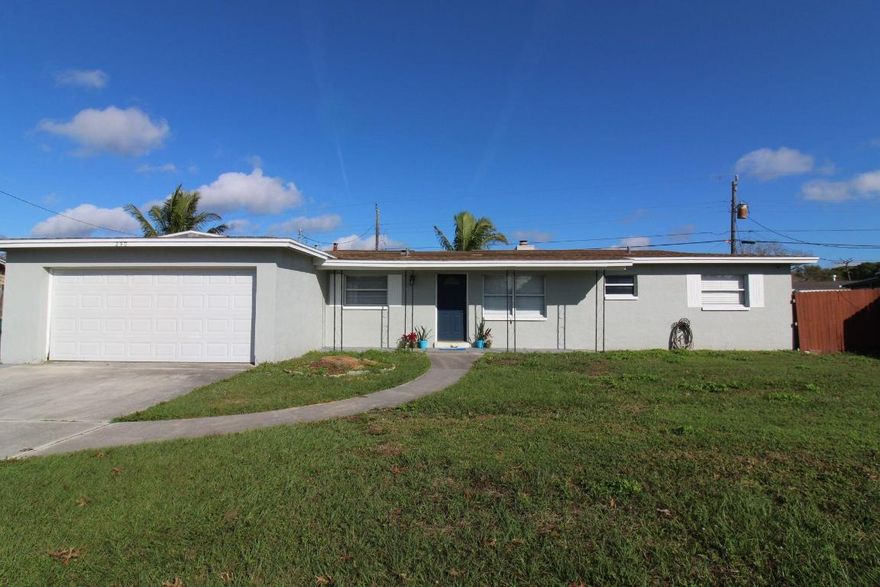 Welcome to this stunning concrete block pool home in the heart of Merritt Island! This updated property boasts an open floor plan, tile floors throughout, a cozy fireplace, and an updated electric system. The master suite offers a walk-in shower and walk-in closet, while the second bathroom features a luxurious jet tub. Enjoy peace of mind with a new garage door, 5-year-old A/C, and a 7-year-old roof. Outside, the fenced yard, renovated pool (updated just 3 years ago) and multiple patios create the perfect oasis for relaxation and entertaining. Located near schools, parks, shopping, dining, and the beach, this home offers the ultimate in convenience. With its spacious yard, in-house laundry room, and vacant status, this property is easy to show and ready to move in.