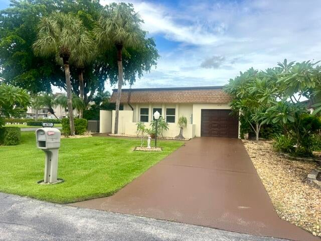 Photo of 6787 Starkeys Place, Lake Worth, FL 33467 (MLS # B26079742)