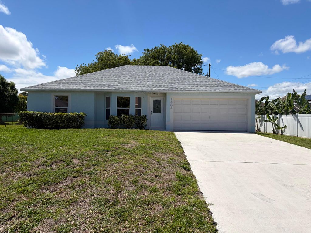 Photo of 1682 SW Glacador Avenue, Port Saint Lucie, FL 34953 (MLS # B26018506)