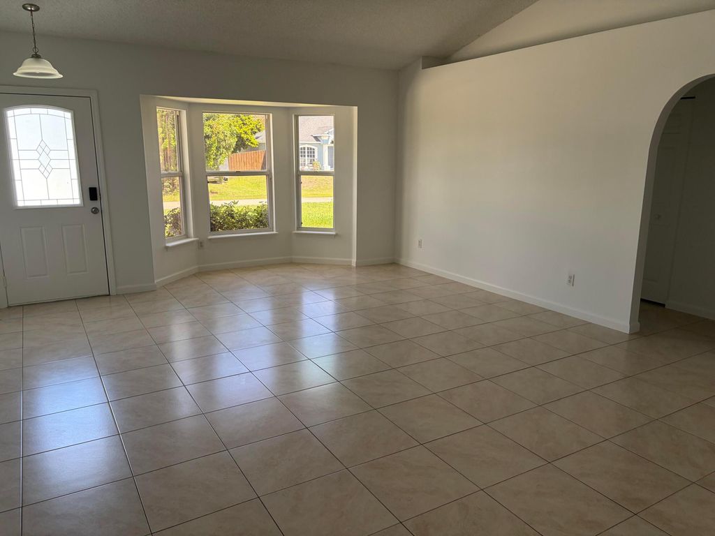 Photo of 1682 SW Glacador Avenue, Port Saint Lucie, FL 34953 (MLS # B26018506)