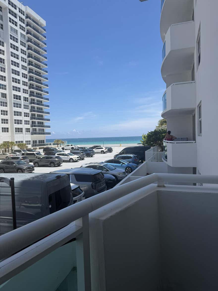 Experience coastal living at its finest in this beautifully maintained residence at The Residences on Hollywood Beach. Unit 204 offers a spacious and inviting layout with an open-concept living and dining area, abundant natural light, and a private balcony perfect for enjoying tropical breezes. The kitchen features ample cabinetry and functional workspace ideal for everyday living or entertaining. Residents enjoy resort-style amenities including direct beach access, heated pool, jacuzzi, fitness center, sauna, tiki hut, BBQ area, valet, concierge, and 24-hour security. Ideally located near the Hollywood Broadwalk, fine dining, shopping, airports, and major highways, this is South Florida beachfront living at an exceptional value.   The Unit has impact windows and ocean view.