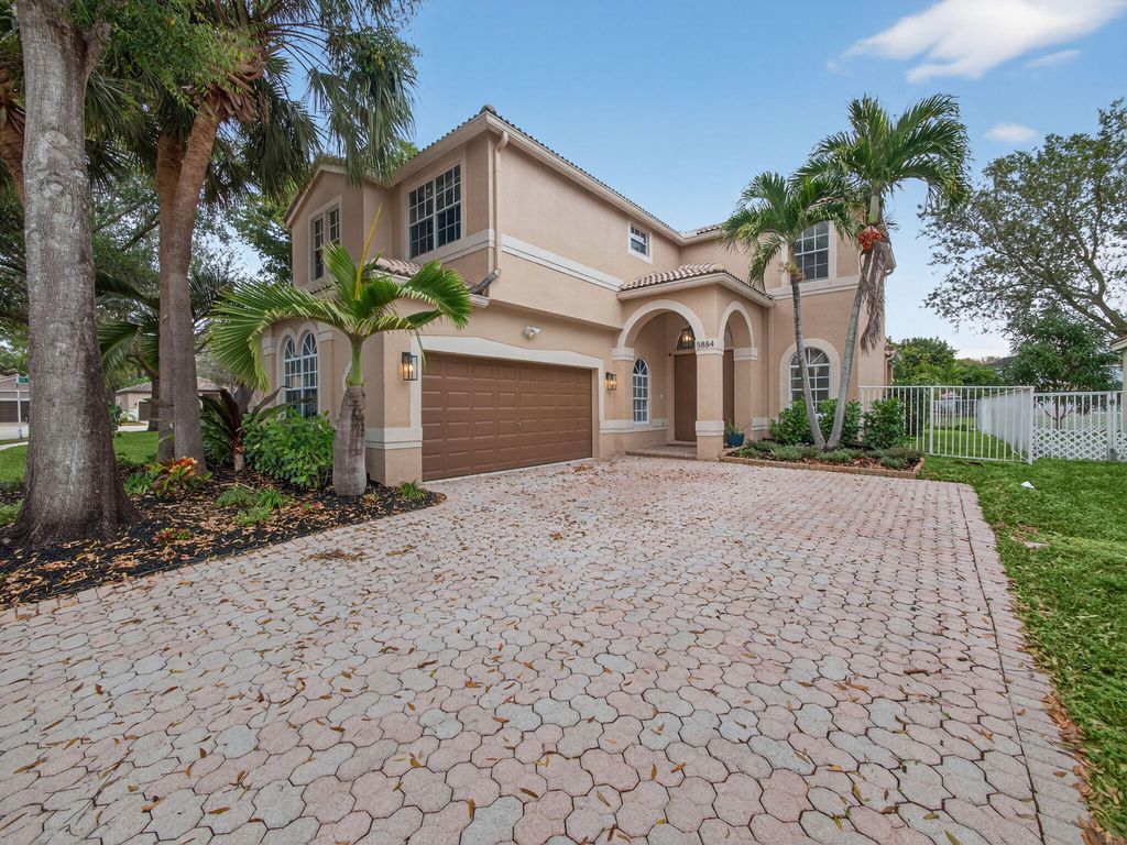Photo of 5884 NW 49th Lane, Coconut Creek, FL 33073 (MLS # R11160185)