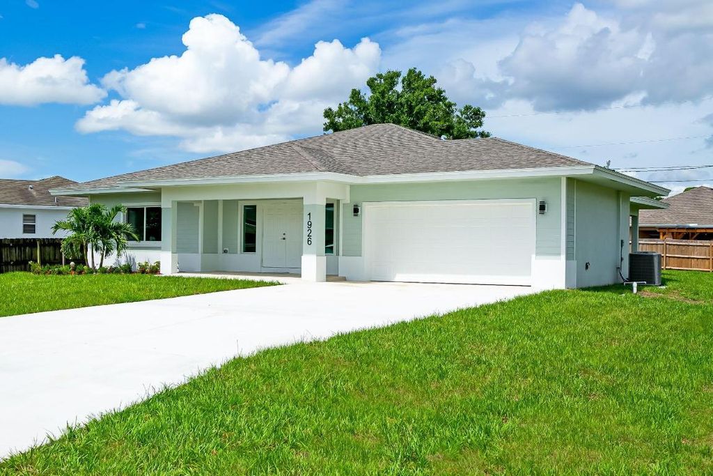 Photo of 1926 SW Diamond Street, Port Saint Lucie, FL 34953 (MLS # R10997006)