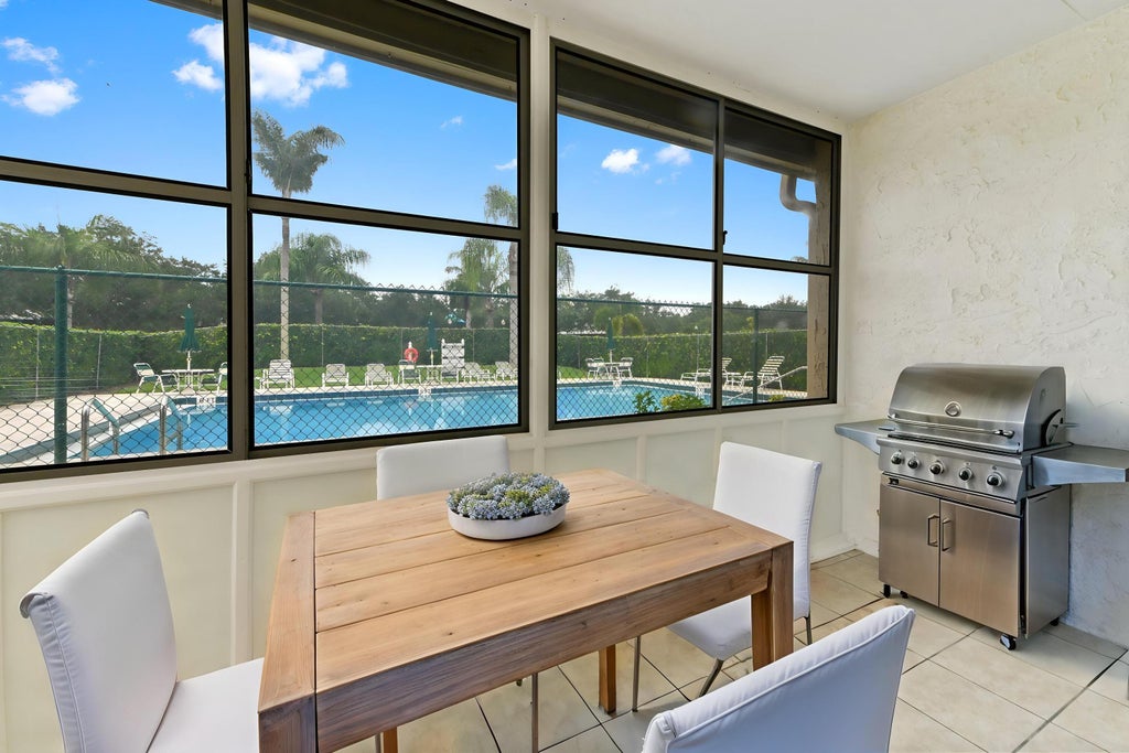 Photo of 126 Sparrow Drive #22A, Royal Palm Beach, FL 33411 (MLS # B26061531)