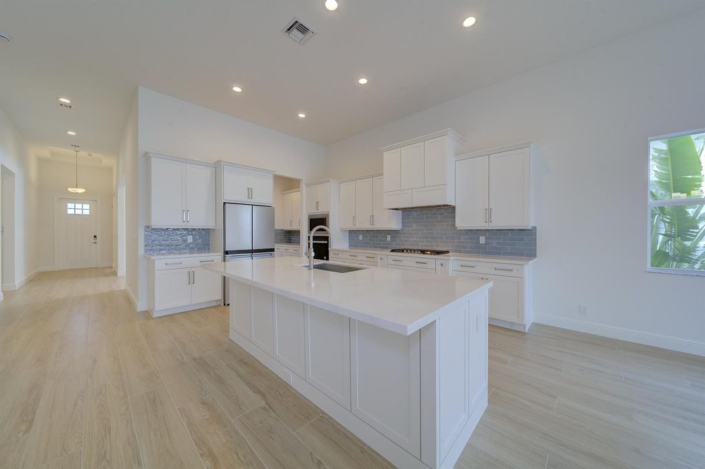 Photo of 12512 Nautilus Circle, Palm Beach Gardens, FL 33412 (MLS # R10960033)