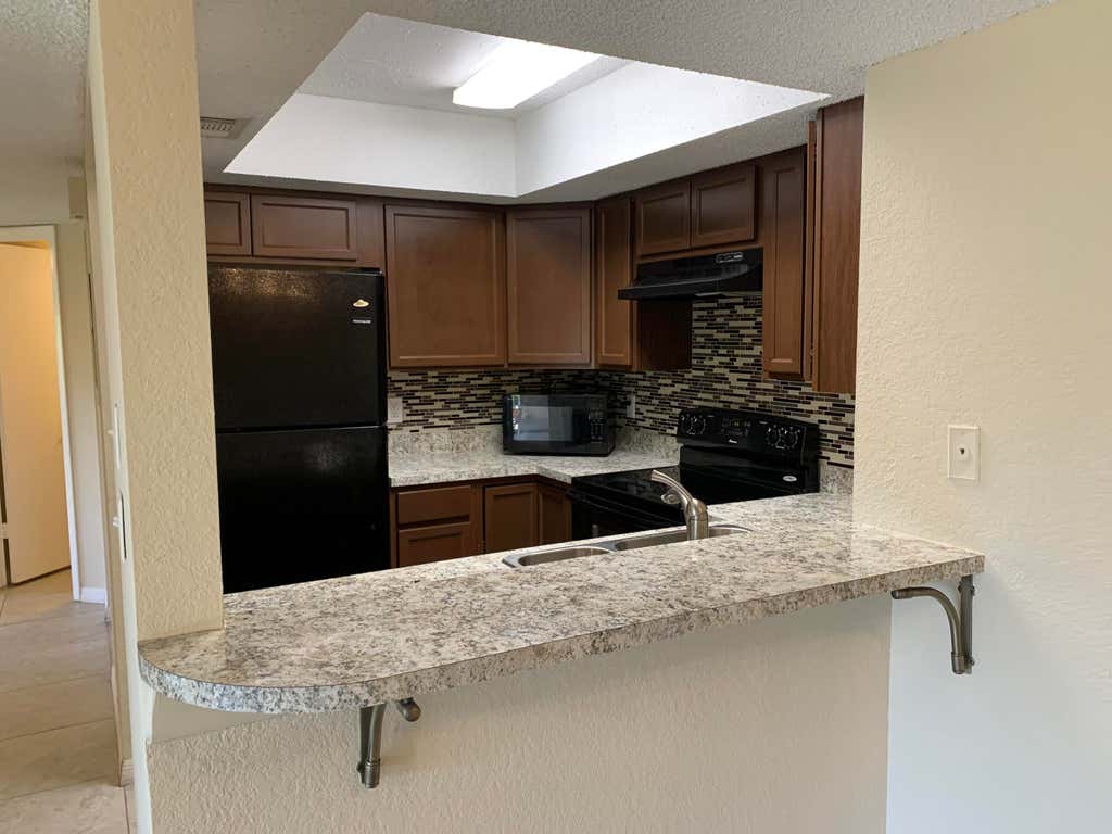 Photo of 1537 SE Royal Green Circle #E-202, Port St Lucie, FL 34952 (MLS # R10869145)