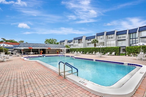 Tiny photo for 7827 GOLF CIR Drive #301, Margate, FL 33063 (MLS # B26065435)