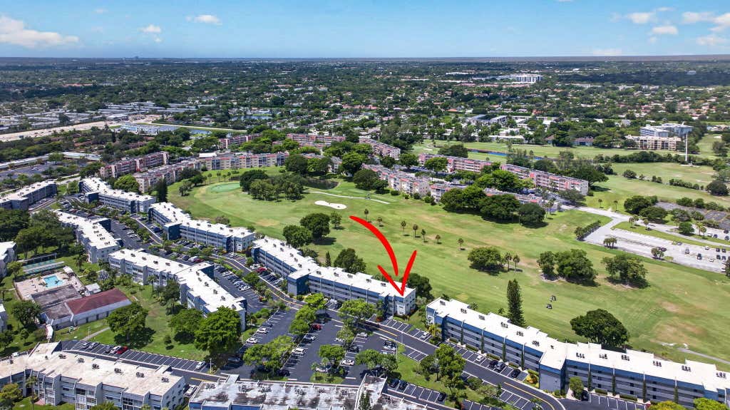 Photo of 7827 GOLF CIR Drive #301, Margate, FL 33063 (MLS # B26065435)