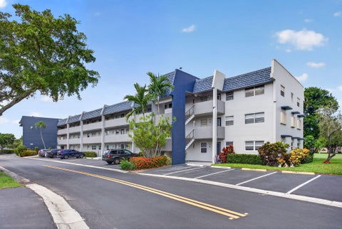 Photo of 7827 GOLF CIR Drive #301, Margate, FL 33063 (MLS # B26065435)