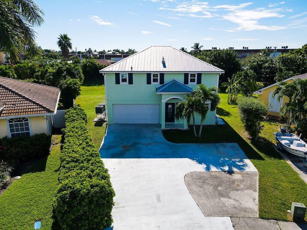 Photo of 1261 Bonefish Court, Fort Pierce, FL 34949 (MLS # R10718569)