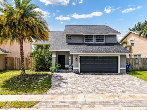 Photo of 12252 NW 32nd Manor, Sunrise, FL 33323 (MLS # B26023383)
