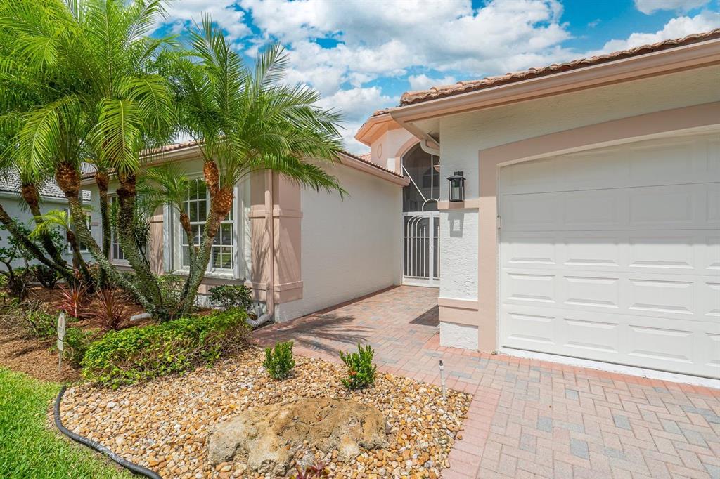 MOVE-IN Ready! This waterfront Madrid is the perfect clean slate for any buyer. Brand NEW A/C, Brand NEW GE S/S Profile Kitchen Appliances, Brand NEW water heater, Brand NEW ceiling fans, LED high hats, and window treatments in the front bedrooms. FRESHLY painted in a neutral color .. the walls are ready for your personal touch! Tile flooring throughout the main living area and wide planked wood laminate floors in the bedrooms. 4th bedroom was used as a den/office and would need the closet doors/shelving added. Updated 1/2 bath with new toilet, pedestal sink, mirror and light. Tiled lanai with plexi windows enables you to use this room even on a rainy day! Accordion shutters, freshly landscaped and so much more! Valencia Isles newly renovated clubhouse w/ bistro is now open!