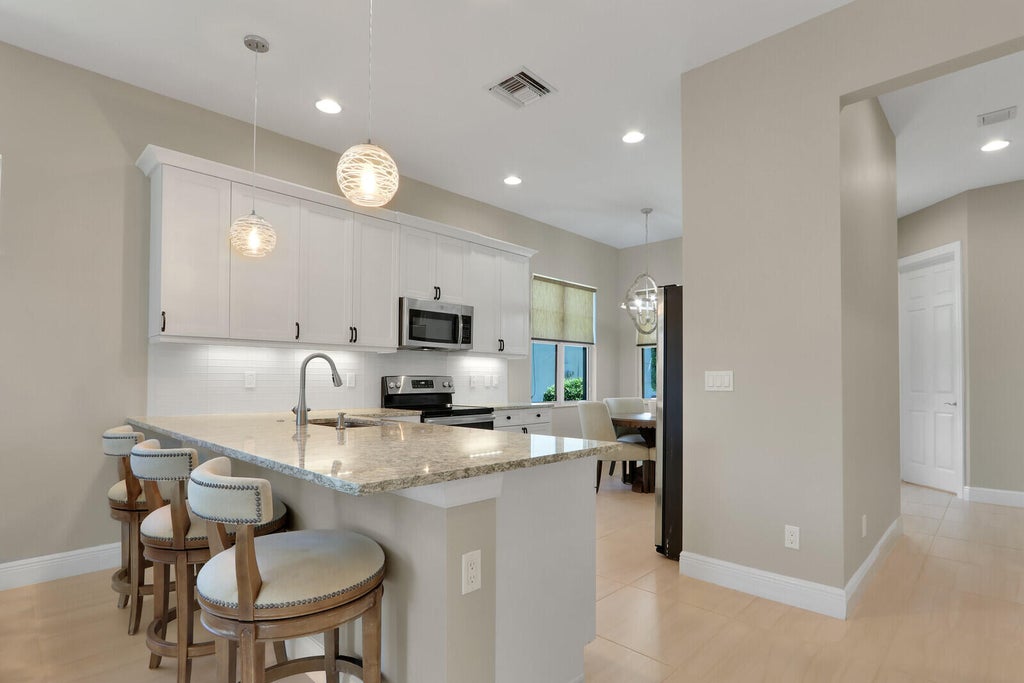Photo of 8942 SW PEPOLI Way, Port Saint Lucie, FL 34987 (MLS # B26076991)