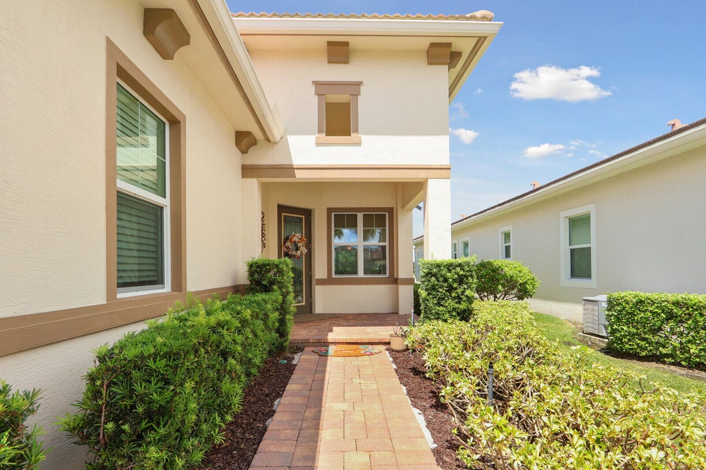 Photo of 8942 SW PEPOLI Way, Port Saint Lucie, FL 34987 (MLS # B26076991)