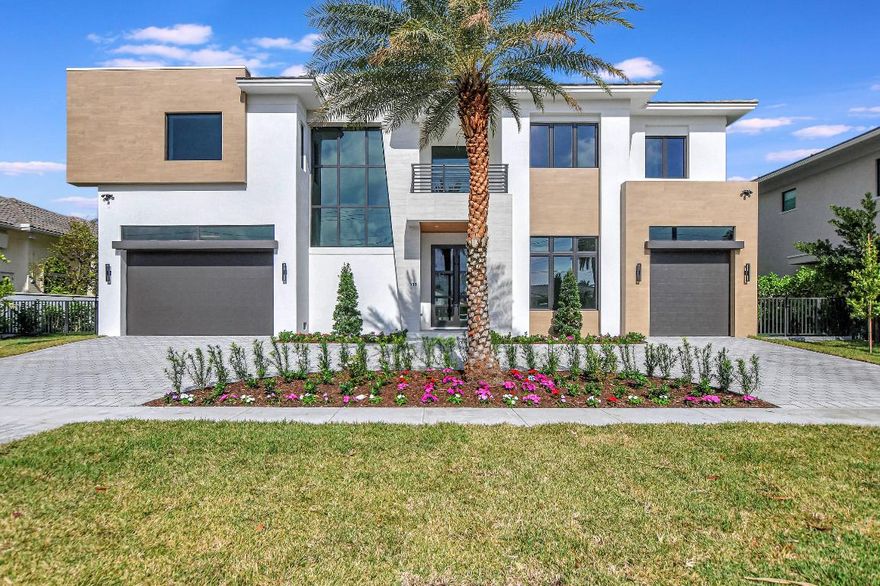 Bring Your Yacht and walk to the beach at this brand new No Fixed Bridge Lake Rogers Isle Deepwater estate. This Luxury New Construction home encompasses unparalleled features, expertly crafted by Elysee Homes, one of Boca Raton's premier custom builders. The residence boasts a resort-style pool deck, a concrete dock perfect for yacht enthusiasts, and full summer kitchen. Enjoy the ultimate comfort with his and her master suites, complemented by a full house generator, elevator, and a natural gas meter. The property's unique appeal extends to its large turn basin, providing convenient boat maneuvering.