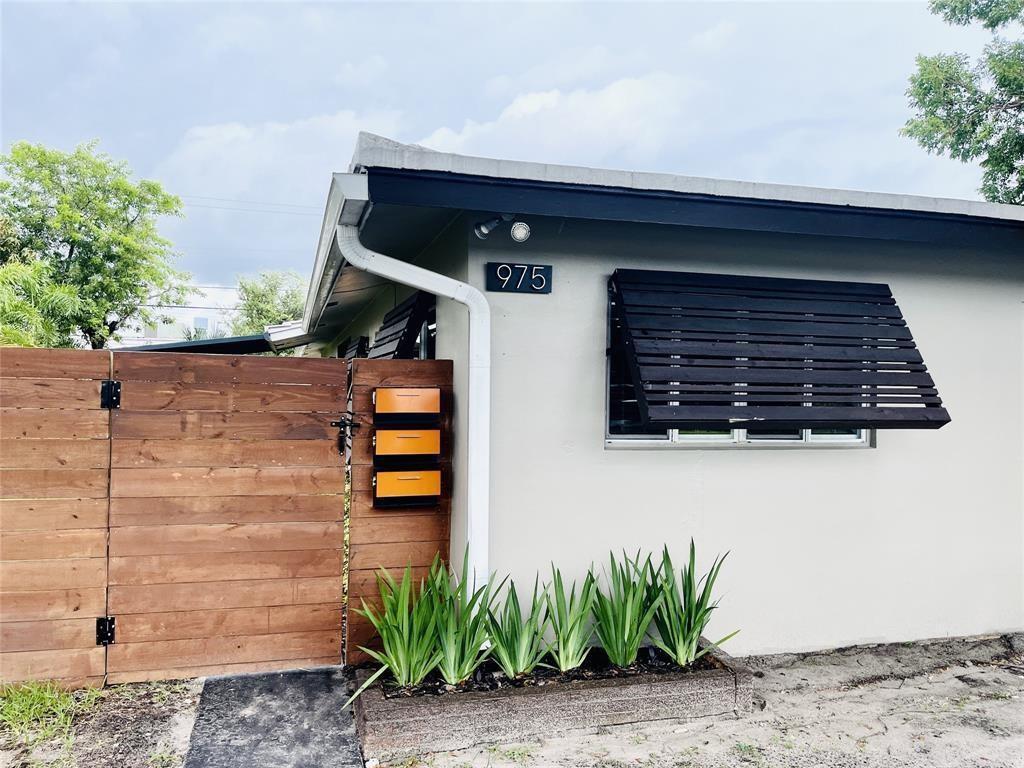 Photo of 975 NE 40th Street #B, Oakland Park, FL 33334 (MLS # B26039521)