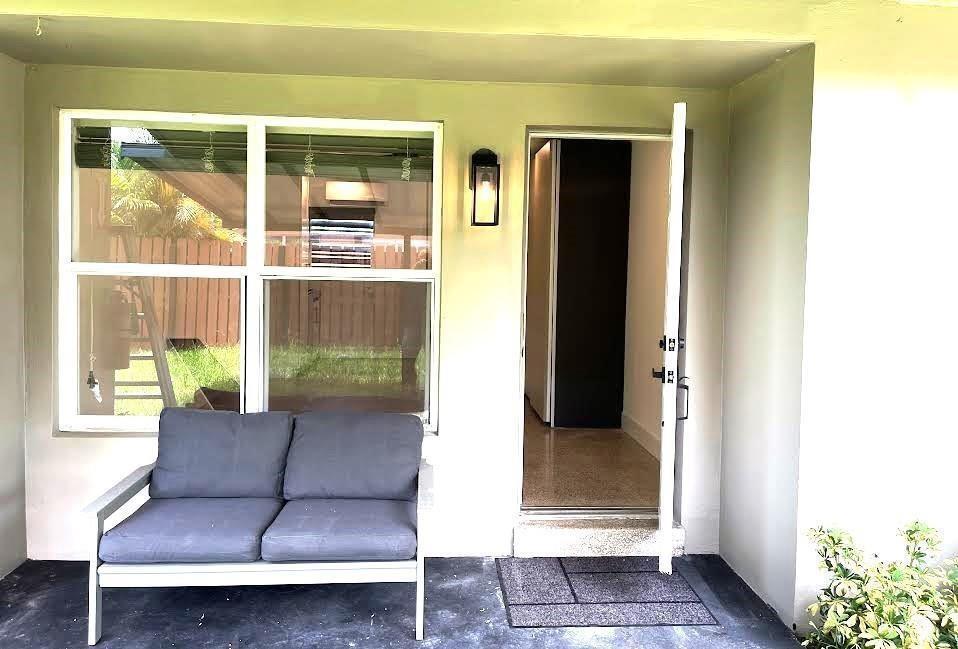 Photo of 975 NE 40th Street #B, Oakland Park, FL 33334 (MLS # B26039521)