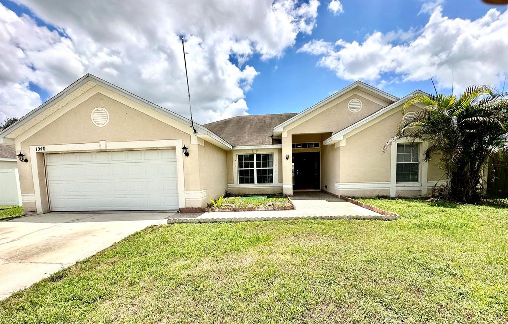 Photo of 1540 SW Birkey Avenue, Port Saint Lucie, FL 34953 (MLS # R11115371)